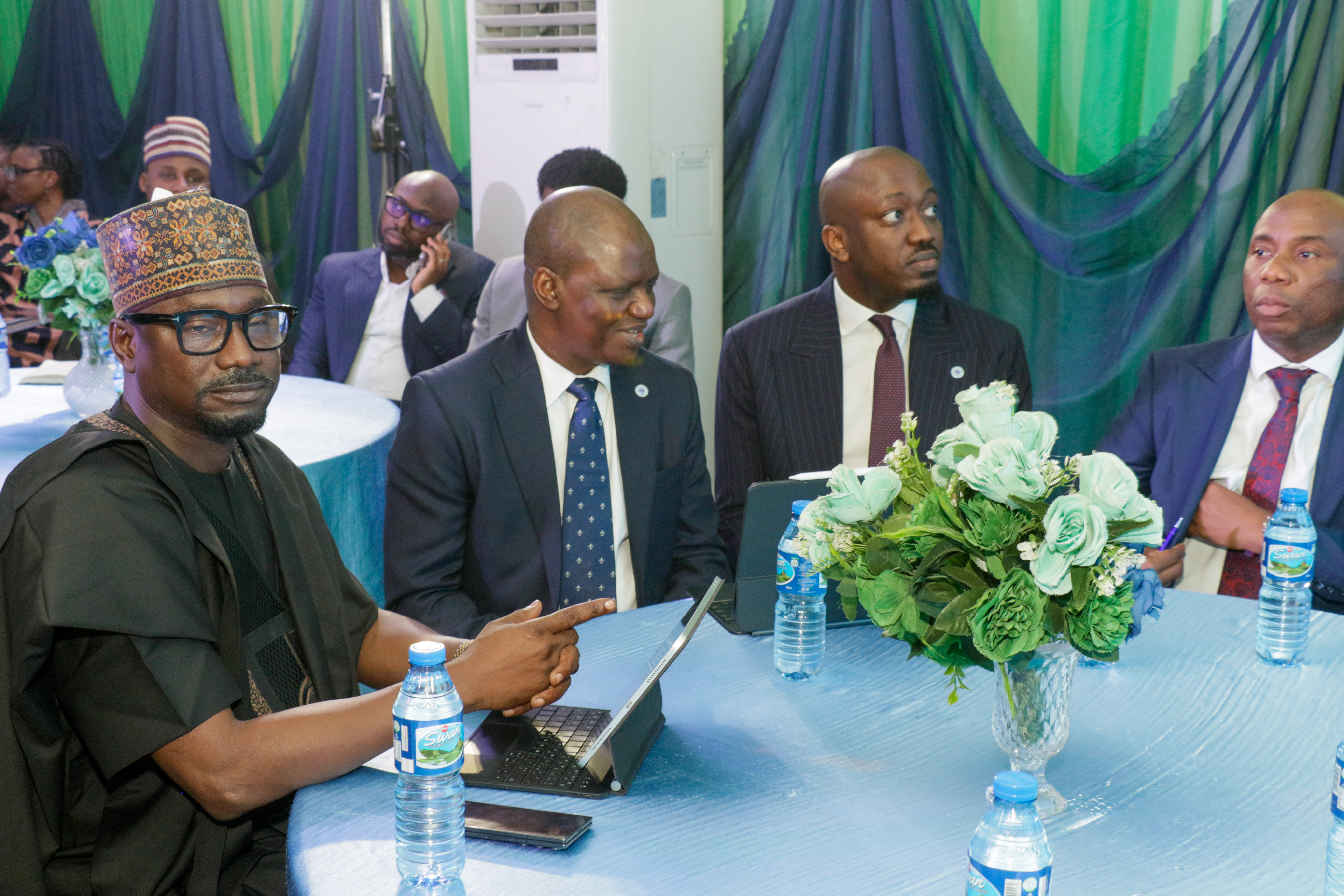 L-R: The MD/CEO of REA, Dr. Abba Aliyu, The MD of Lotus Bank and other Top management of Lotus Bank during an MOU signing of 100 billion non-interest facility support for timely deployment of mini-grid across Nigeria.